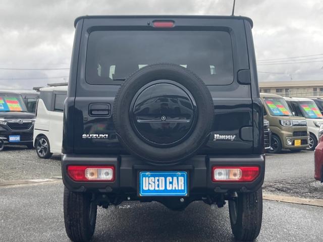 ジムニー ＸＣ　４ＷＤ　ＡＴ　届出済未使用車　衝突軽減ブレーキ　シートヒーター　コーナーセンサー　レーン逸脱警報　誤発進抑制装置　純正１６ＡＷ　革巻ハンドル　スマートキー　ターボ　クルコン　オートハイビーム　ＬＥＤヘッドライト　フォグライト　背面タイヤ　電格ミラー（23枚目）