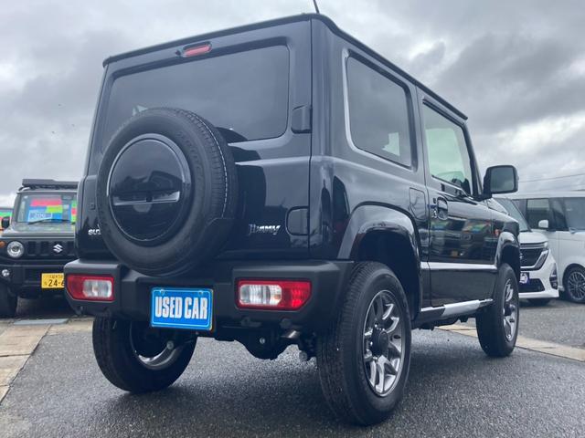 ジムニー ＸＣ　４ＷＤ　ＡＴ　届出済未使用車　衝突軽減ブレーキ　シートヒーター　コーナーセンサー　レーン逸脱警報　誤発進抑制装置　純正１６ＡＷ　革巻ハンドル　スマートキー　ターボ　クルコン　オートハイビーム　ＬＥＤヘッドライト　フォグライト　背面タイヤ　電格ミラー（29枚目）