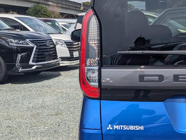 デリカミニ Ｔ　プレミアム　純正９インチディスプレイオーディオ　ターボ　両側パワードア　衝突軽減ブレーキ　Ｂｌｕｅｔｏｏｔｈ　電動Ｐブレーキ　全方位カメラ　シートヒーター　ハーフレザーシート　ＨＤＭＩ接続　パドルシフト　ＥＴＣ　純正１５ＡＷ　クルコン　ＭＴモード付（29枚目）