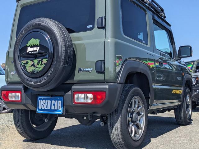 ジムニー ＸＣ　４ＷＤ　ＡＴ　メディアオーディオ　Ｂｌｕｅｔｏｏｔｈ　バックカメラ　前後ドラレコ　シートヒーター　革巻ハンドル　ＥＴＣ　ターボ　クルーズコントロール　純正１６ＡＷ　ルーフキャリア　レーン逸脱警報　オートハイビーム　革巻ハンドル　ＤＶＤ再生　背面タイヤ（33枚目）