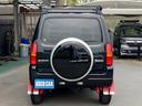ジムニー ランドベンチャー　１０型ＡＴ　４ＷＤ　メモリーナビ　記録簿　レザーシート　シートヒーター　ドラレコ　フルセグＴＶ　ＥＴＣ　ＤＶＤ再生　ツイーター　けん引フック　ルーフキャリア　サイドガード　マッドガード　ターボ　革巻ハンドル　背面カバー　フォグ　電格ミラー（8枚目）