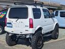 ジムニー XG 4WD 5MT リフトアップ 高さ構造変更済 SDナビ 革調シートカバー 牽引フック オーバーフェンダー 社外16AW 社外マフラー 社外ホーン Bluetooth フルセグTV LEDヘッドライト サイドステップ LEDフォグ ターボ ルーフキャリア(6枚目)