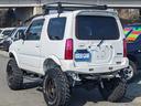 ジムニー XG 4WD 5MT リフトアップ 高さ構造変更済 SDナビ 革調シートカバー 牽引フック オーバーフェンダー 社外16AW 社外マフラー 社外ホーン Bluetooth フルセグTV LEDヘッドライト サイドステップ LEDフォグ ターボ ルーフキャリア(8枚目)