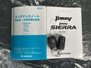 ジムニー ＸＣ　４ＷＤ　ＡＴ　ワンオーナー　衝突軽減ブレーキ　クルーズコントロール　コーナーセンサー　レーン逸脱警報　純正１６ＡＷ　シートヒーター　オートハイビーム　ＬＥＤヘッドライト　ヘッドライトウォッシャー　アイドリングストップ　スマートキー　背面タイヤ（5枚目）