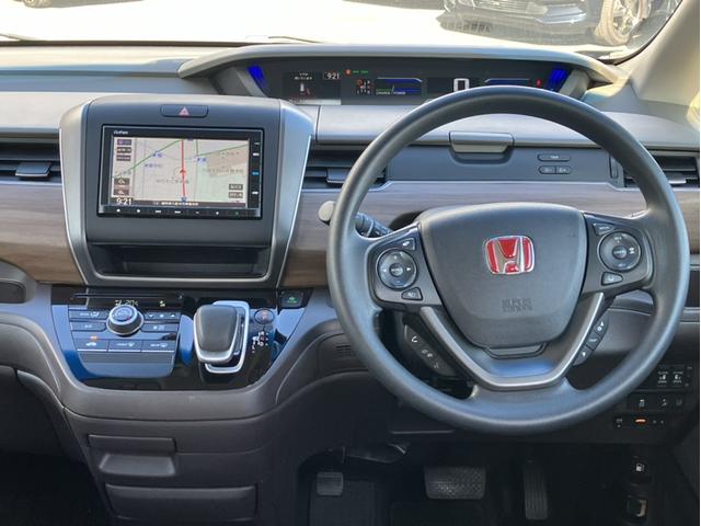 フリードハイブリッド ハイブリッド・Ｇホンダセンシング　純正ナビ＆Ｂｌｕｅｔｏｏｔｈ＆Ｂカメラ＆ＥＴＣ＆前後ドラレコ　軽減ブレーキ　キーフリーシステム　サイドカーテンエアバック　ＥＣＯＮ　後カメラ　Ａクルーズ　ＬＥＤヘッドランプ　横滑防止　ドライブレコーダ（9枚目）