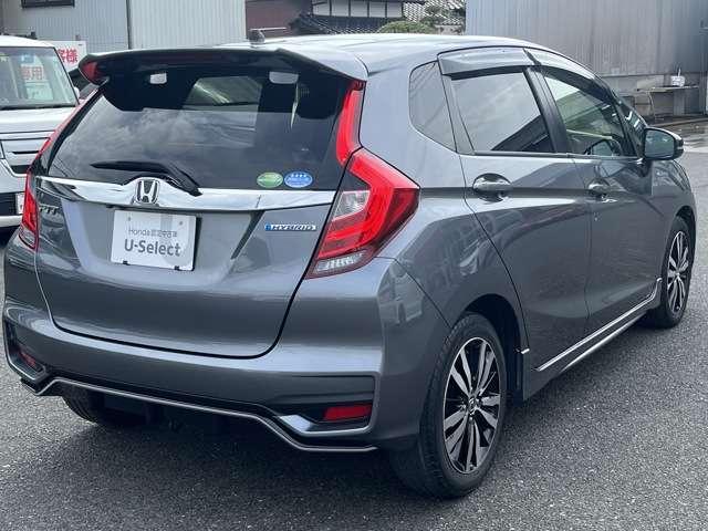 フィットハイブリッド ホンダ ｓ ホンダセンシング 純正ナビ ｂｔオーディオ バックモニター 誤発進抑制 ｅｔｃ車載器 ａｂｓ 横滑り防止機能 サイドカーテンエアバック ａｗ オートエアコン ｒカメラ 記録簿 メモリナビ ｗエアバッグ 禁煙車 ナビ 福岡県 ｓ ホンダ