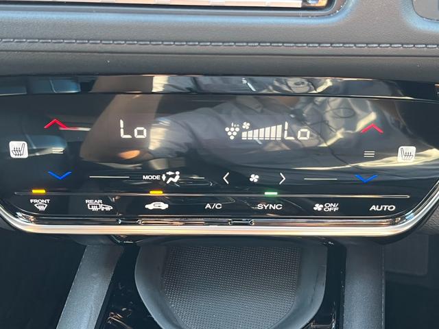 ヴェゼル ハイブリッドＺ・ホンダセンシング　純正９インチナビ／フルセグ／ＣａｒＰｌａｙ／バックモニター／ＥＴＣ　レーダーサポート　Ｗエアコン　１オーナ－　ＤＶＤ再生機能　横滑り防止システム　バックアイカメラ　盗難防止装置　シートヒーター付　禁煙（15枚目）