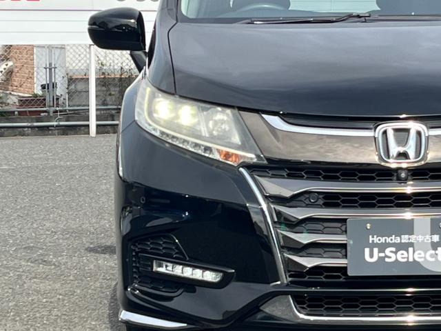 オデッセイ アブソルート・ＥＸホンダセンシング　レザーシート／純正８インチナビ／フリップダウン／マルチビュー／大型アームレスト／コーナーセンサー／ＢＳＭ／ＥＴＣ　フルセグテレビ　ワンオーナ　３６０°カメラ　横滑り防止装置　シ－トヒ－タ－　本革シート（24枚目）
