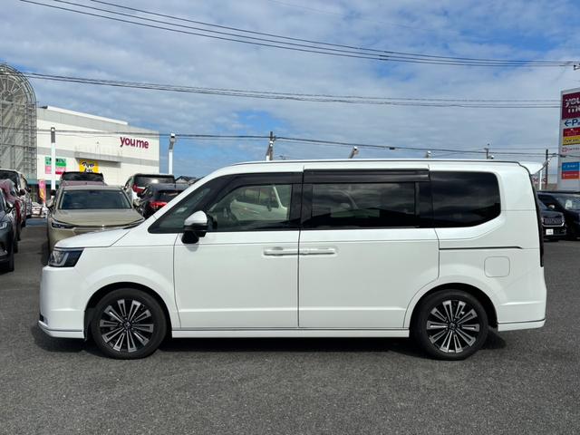 ステップワゴン スパーダプレミアムライン　ナビ／後席フリップダウンモニター／全方位モニター／ＥＴＣ／ドラレコ　ウォークスルー　セキュリティアラーム　ＵＳＢ　衝突軽減ブレーキ　クルーズコントロール　ＥＳＣ　バックモニター　ＡＢＳ　ＤＶＤ再生（4枚目）