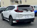 ＣＲ－Ｖハイブリッド ｅ：ＨＥＶＥＸ・ブラックエディション　無限エアロ／レザー／サンルーフ／純正ナビ／フルセグ／ＣａｒＰｌａｙ／バックモニター／ＥＴＣ／ＢＳＭ／ドラレコ　電動リヤゲート　スマートキー　ＤＶＤ再生　１オーナー　衝突被害軽減システム　レザーシート（5枚目）