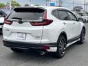 ＣＲ－Ｖハイブリッド ｅ：ＨＥＶＥＸ・ブラックエディション　無限エアロ／レザー／サンルーフ／純正ナビ／フルセグ／ＣａｒＰｌａｙ／バックモニター／ＥＴＣ／ＢＳＭ／ドラレコ　電動リヤゲート　スマートキー　ＤＶＤ再生　１オーナー　衝突被害軽減システム　レザーシート（6枚目）