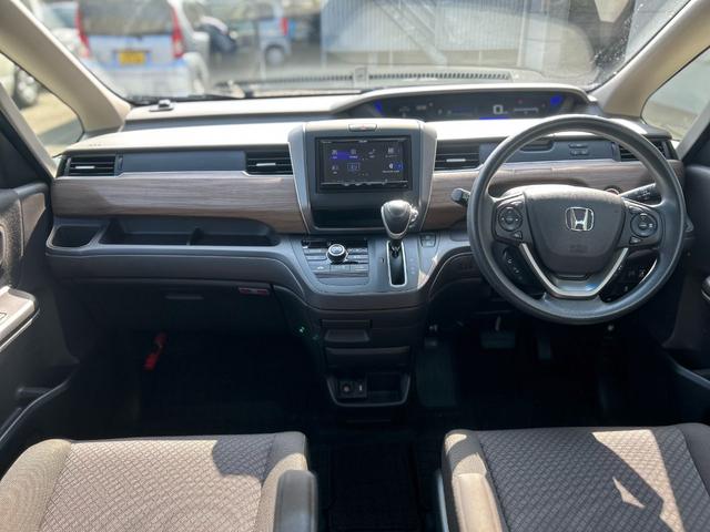 フリード Ｇ・ホンダセンシング　ナビ　バックカメラ　ＥＴＣ　両側電動スライドドア　スマートキー　プッシュスタート　クルーズコントロール　衝突回避軽減　横滑り防止装置　アイドリングストップ　３列シート　ウィンカーミラー（2枚目）