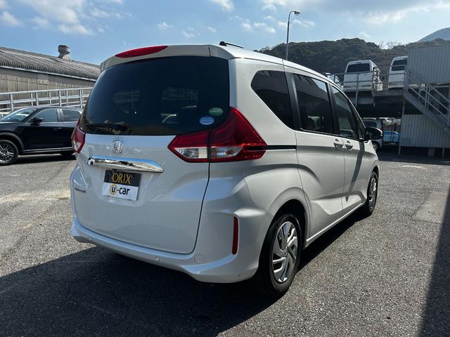 フリード Ｇ・ホンダセンシング　ナビ　バックカメラ　ＥＴＣ　両側電動スライドドア　スマートキー　プッシュスタート　クルーズコントロール　衝突回避軽減　横滑り防止装置　アイドリングストップ　３列シート　ウィンカーミラー（3枚目）