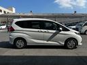 フリード Ｇ・ホンダセンシング　ナビ　バックカメラ　ＥＴＣ　両側電動スライドドア　スマートキー　プッシュスタート　クルーズコントロール　衝突回避軽減　横滑り防止装置　アイドリングストップ　３列シート　ウィンカーミラー（7枚目）