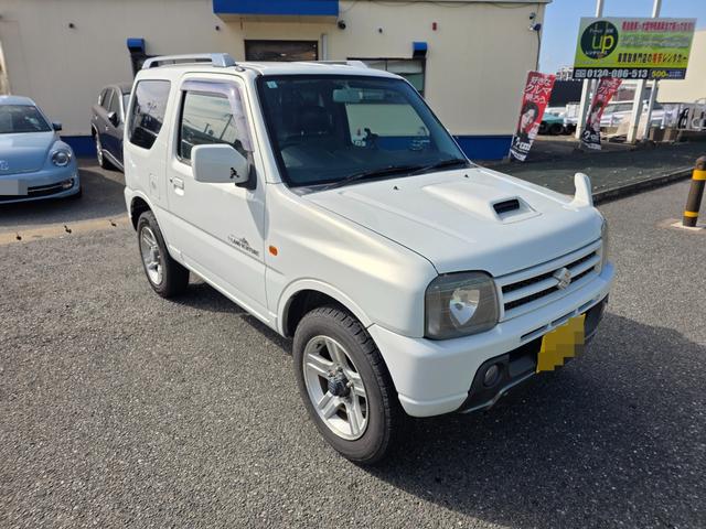 ジムニー ランドベンチャー　４ＷＤ　キーレスエントリー　電動格納ミラー　シートヒーター　オートマ　ＡＢＳ　アルミホイール　衝突安全ボディ　エアコン　パワーウィンドウ　運転席エアバッグ　パールホワイト（3枚目）