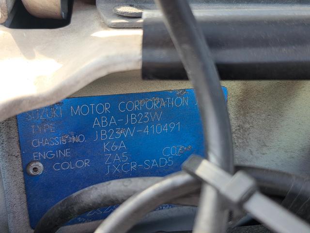 ジムニー ランドベンチャー　４ＷＤ　キーレスエントリー　電動格納ミラー　シートヒーター　オートマ　ＡＢＳ　アルミホイール　衝突安全ボディ　エアコン　パワーウィンドウ　運転席エアバッグ　パールホワイト（12枚目）