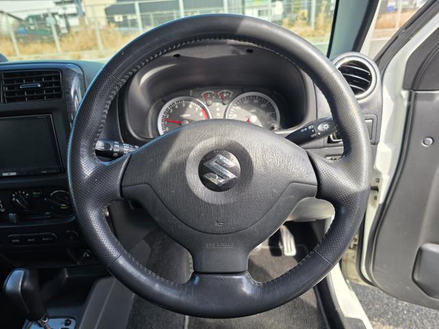 ジムニー ランドベンチャー　４ＷＤ　キーレスエントリー　電動格納ミラー　シートヒーター　オートマ　ＡＢＳ　アルミホイール　衝突安全ボディ　エアコン　パワーウィンドウ　運転席エアバッグ　パールホワイト（16枚目）