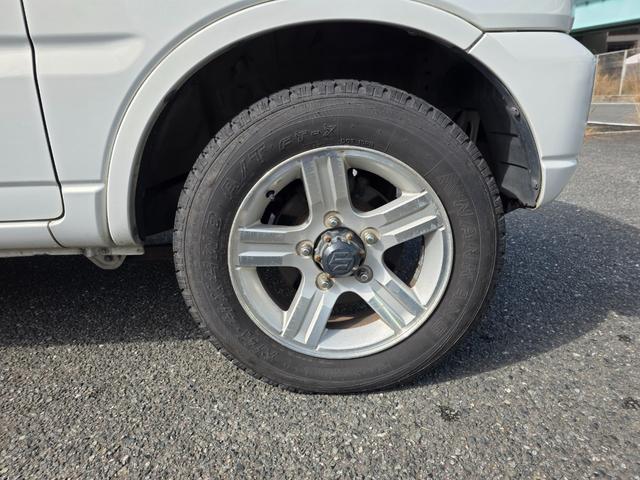 ジムニー ランドベンチャー　４ＷＤ　キーレスエントリー　電動格納ミラー　シートヒーター　オートマ　ＡＢＳ　アルミホイール　衝突安全ボディ　エアコン　パワーウィンドウ　運転席エアバッグ　パールホワイト（29枚目）