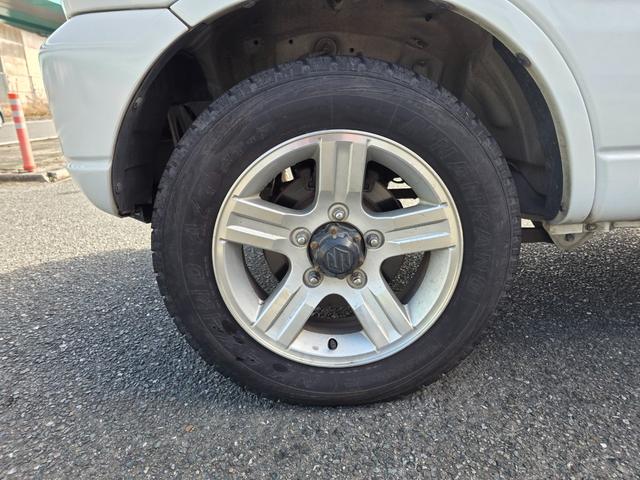 ジムニー ランドベンチャー　４ＷＤ　キーレスエントリー　電動格納ミラー　シートヒーター　オートマ　ＡＢＳ　アルミホイール　衝突安全ボディ　エアコン　パワーウィンドウ　運転席エアバッグ　パールホワイト（30枚目）