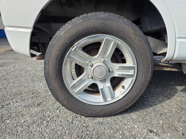 ジムニー ランドベンチャー　４ＷＤ　キーレスエントリー　電動格納ミラー　シートヒーター　オートマ　ＡＢＳ　アルミホイール　衝突安全ボディ　エアコン　パワーウィンドウ　運転席エアバッグ　パールホワイト（32枚目）