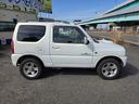 ジムニー ランドベンチャー　４ＷＤ　キーレスエントリー　電動格納ミラー　シートヒーター　オートマ　ＡＢＳ　アルミホイール　衝突安全ボディ　エアコン　パワーウィンドウ　運転席エアバッグ　パールホワイト（5枚目）