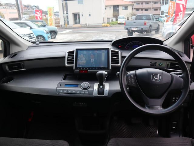 フリード Ｇ　ジャストセレクション　ＥＴＣ　バックカメラ　ナビ　ＴＶ　両側電動スライドドア　ＨＩＤ　スマートキー　電動格納ミラー　後席モニター　３列シート　ＣＶＴ　ＣＤ　ＤＶＤ再生　ＵＳＢ　ミュージックプレイヤー接続可（3枚目）