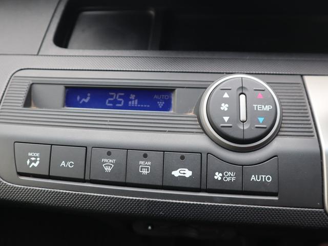 フリード Ｇ　ジャストセレクション　ＥＴＣ　バックカメラ　ナビ　ＴＶ　両側電動スライドドア　ＨＩＤ　スマートキー　電動格納ミラー　後席モニター　３列シート　ＣＶＴ　ＣＤ　ＤＶＤ再生　ＵＳＢ　ミュージックプレイヤー接続可（11枚目）