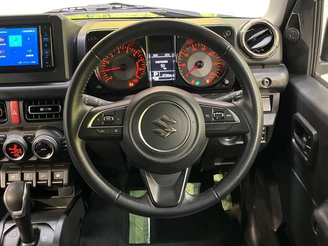ジムニー ＸＣ　４ＷＤ　ターボ　ＳＤナビ　バックカメラ　デュアルセンサーブレーキサポート　禁煙車　前席シートヒーター　黒革調シートカバー　ドラレコ　スマートキー　ＬＥＤヘッド　ＥＴＣ　オールテレーンタイヤ（12枚目）