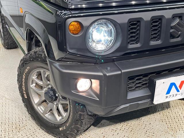 ジムニー ＸＣ　４ＷＤ　ターボ　ＳＤナビ　バックカメラ　デュアルセンサーブレーキサポート　禁煙車　前席シートヒーター　黒革調シートカバー　ドラレコ　スマートキー　ＬＥＤヘッド　ＥＴＣ　オールテレーンタイヤ（13枚目）