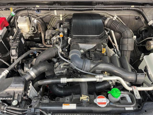 ジムニー ＸＣ　４ＷＤ　ターボ　ＳＤナビ　バックカメラ　デュアルセンサーブレーキサポート　禁煙車　前席シートヒーター　黒革調シートカバー　ドラレコ　スマートキー　ＬＥＤヘッド　ＥＴＣ　オールテレーンタイヤ（18枚目）