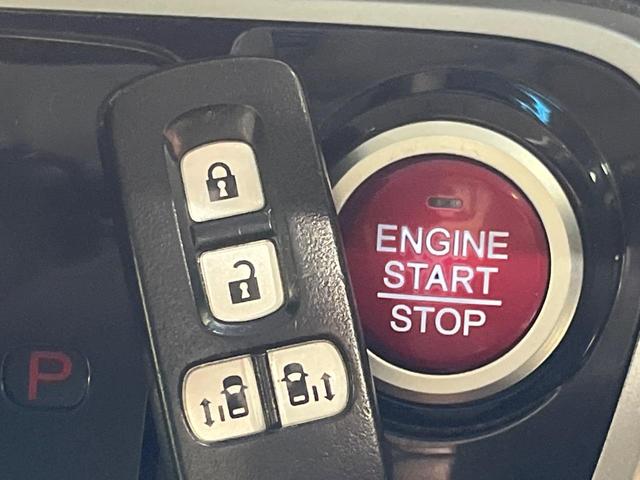 N-BOXカスタム G ターボSSパッケージ 純正ナビ バックカメラ 両側電動スライドドア 禁煙車 スマートキー HIDヘッド ETC クルコン オートライト オートエアコン 純正15インチアルミ Bluetooth再生 CD/DVD再生(6枚目)