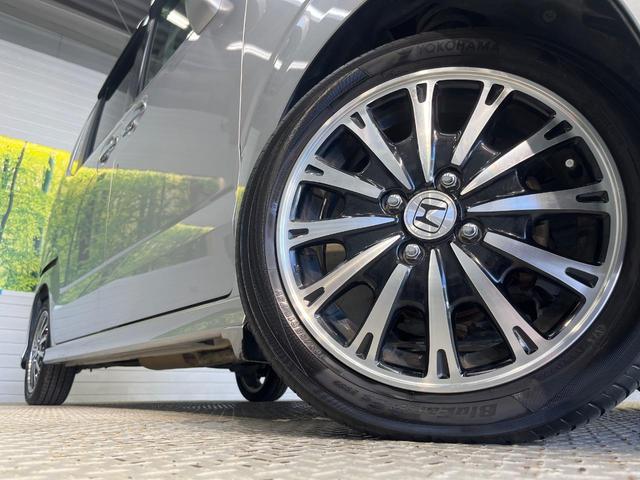 N-BOXカスタム G ターボSSパッケージ 純正ナビ バックカメラ 両側電動スライドドア 禁煙車 スマートキー HIDヘッド ETC クルコン オートライト オートエアコン 純正15インチアルミ Bluetooth再生 CD/DVD再生(14枚目)