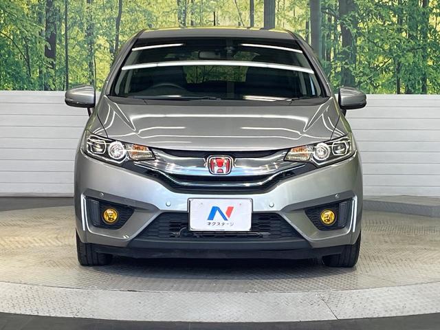 フィットハイブリッド Ｌパッケージ　インターナビ　ＣＴＢＡ　クルーズコントロール　バックカメラ　ＬＥＤヘッドライト　オートライト　Ｂｌｕｅｔｏｏｔｈ　フルセグ　スマートキー　ＥＴＣ　フロントフォグライト（14枚目）