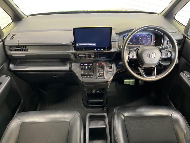 ステップワゴン ｅ：ＨＥＶスパーダ　１５．６型フリップダウン　純正１１型ナビ　ホンダセンシング　両側パワースライド　アダプティブクルーズ　ＢＳＭ　バックカメラ　シートヒーター　ＥＴＣ　Ｂｌｕｅｔｏｏｔｈ　フルセグ（2枚目）