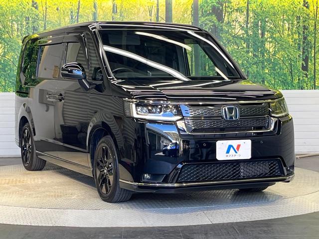 ステップワゴン ｅ：ＨＥＶスパーダ　１５．６型フリップダウン　純正１１型ナビ　ホンダセンシング　両側パワースライド　アダプティブクルーズ　ＢＳＭ　バックカメラ　シートヒーター　ＥＴＣ　Ｂｌｕｅｔｏｏｔｈ　フルセグ（17枚目）