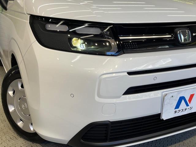 フリード エアー 登録済未使用車 両側電動ドア バックカメラ 衝突被害軽減システム レーダークルーズ コーナーセンサー スマートキー LEDヘッド 車線逸脱警報 オートライト オートエアコン Bluetooth(14枚目)