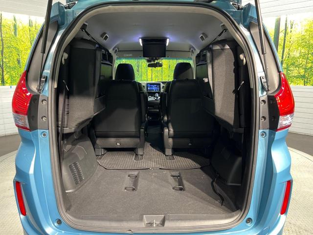 フリードハイブリッド ハイブリッド・ＥＸ　純正９型ナビ　ホンダセンシング　バックカメラ　後席モニター　レーダークルーズコントロール　両側パワースライドドア　シートヒーター　禁煙車　ＬＥＤヘッドランプ　純正１５インチアルミ（10枚目）