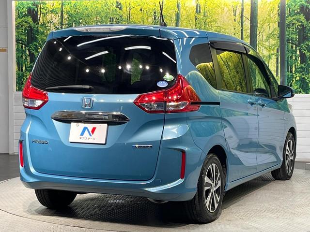 フリードハイブリッド ハイブリッド・ＥＸ　純正９型ナビ　ホンダセンシング　バックカメラ　後席モニター　レーダークルーズコントロール　両側パワースライドドア　シートヒーター　禁煙車　ＬＥＤヘッドランプ　純正１５インチアルミ（17枚目）