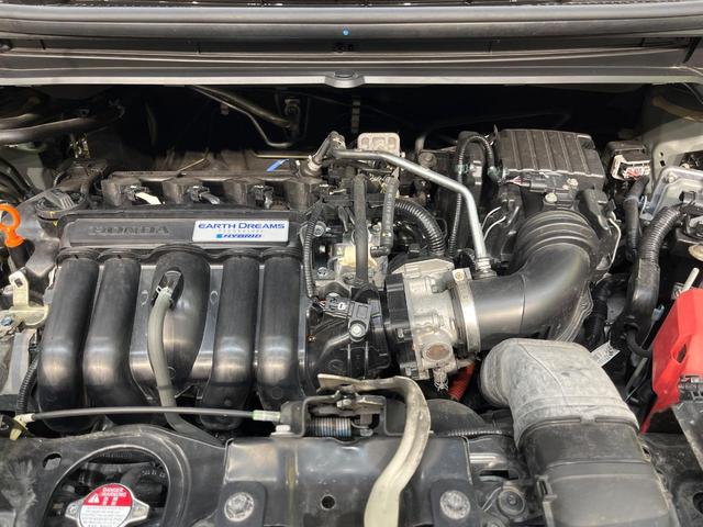 フリードハイブリッド ハイブリッド・ＥＸ　純正９型ナビ　ホンダセンシング　バックカメラ　後席モニター　レーダークルーズコントロール　両側パワースライドドア　シートヒーター　禁煙車　ＬＥＤヘッドランプ　純正１５インチアルミ（18枚目）