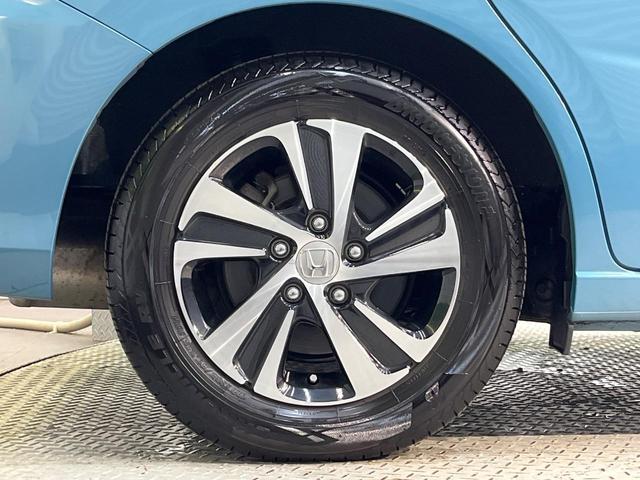 フリードハイブリッド ハイブリッド・ＥＸ　純正９型ナビ　ホンダセンシング　バックカメラ　後席モニター　レーダークルーズコントロール　両側パワースライドドア　シートヒーター　禁煙車　ＬＥＤヘッドランプ　純正１５インチアルミ（28枚目）