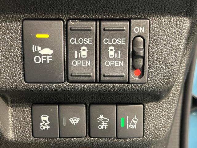 フリードハイブリッド ハイブリッド・ＥＸ　純正９型ナビ　ホンダセンシング　バックカメラ　後席モニター　レーダークルーズコントロール　両側パワースライドドア　シートヒーター　禁煙車　ＬＥＤヘッドランプ　純正１５インチアルミ（36枚目）