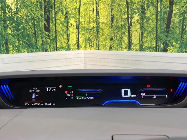 フリードハイブリッド ハイブリッド・ＥＸ　純正９型ナビ　ホンダセンシング　バックカメラ　後席モニター　レーダークルーズコントロール　両側パワースライドドア　シートヒーター　禁煙車　ＬＥＤヘッドランプ　純正１５インチアルミ（49枚目）