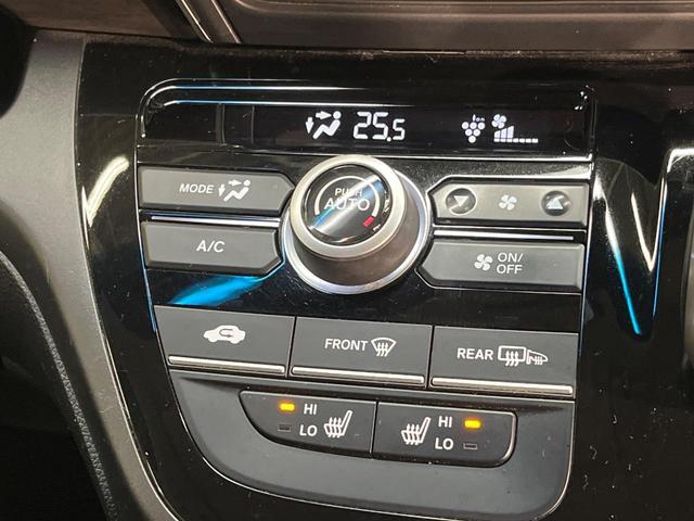 フリードハイブリッド ハイブリッド・ＥＸ　純正９型ナビ　ホンダセンシング　バックカメラ　後席モニター　レーダークルーズコントロール　両側パワースライドドア　シートヒーター　禁煙車　ＬＥＤヘッドランプ　純正１５インチアルミ（52枚目）