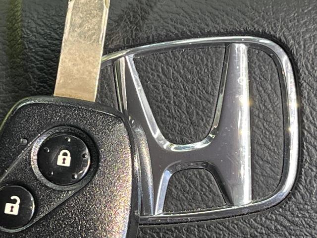 フィットハイブリッド ベースグレード　純正ナビ　クルーズコントロール　キーレス　ＥＴＣ　ヘッドライトレベライザー　オートエアコン　電動格納ミラー（5枚目）