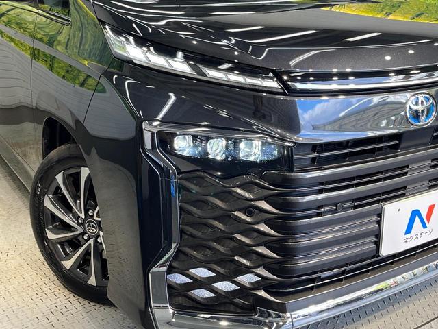 ヴォクシー ハイブリッドＳ－Ｚ　純正１０．５型ナビ　両側電動スライド　１３．２型有機ＥＬ後席モニター　快適利便ＰＫＧ　レーダークルーズ　三眼ＬＥＤライト　パワーバックドア　シートヒーター　ＣＤ／ＤＶＤ　フルセグ　ＥＴＣ２．０　禁煙車（13枚目）