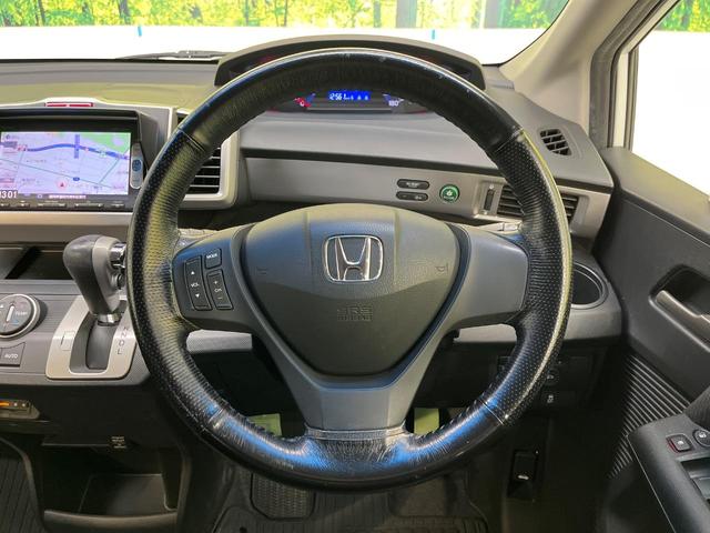 フリード Ｇ　ジャストセレクション　純正ナビ　オートライト　スマートキー　ＥＴＣ　バックカメラ　Ｂｌｕｅｔｏｏｔｈ　ＨＩＤヘッドライト　パワースライドドア　電動格納ミラー　オートエアコン（12枚目）