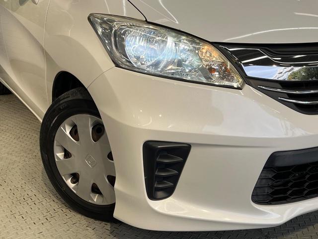 フリード Ｇ　ジャストセレクション　純正ナビ　オートライト　スマートキー　ＥＴＣ　バックカメラ　Ｂｌｕｅｔｏｏｔｈ　ＨＩＤヘッドライト　パワースライドドア　電動格納ミラー　オートエアコン（13枚目）