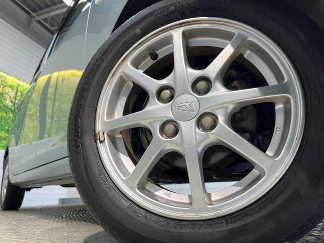 ミライース Ｘ　メモリアルエディション　禁煙車　電動格納ドアミラー　純正１４インチアルミ　ＣＤ　キーレス　アイドリングストップ（11枚目）