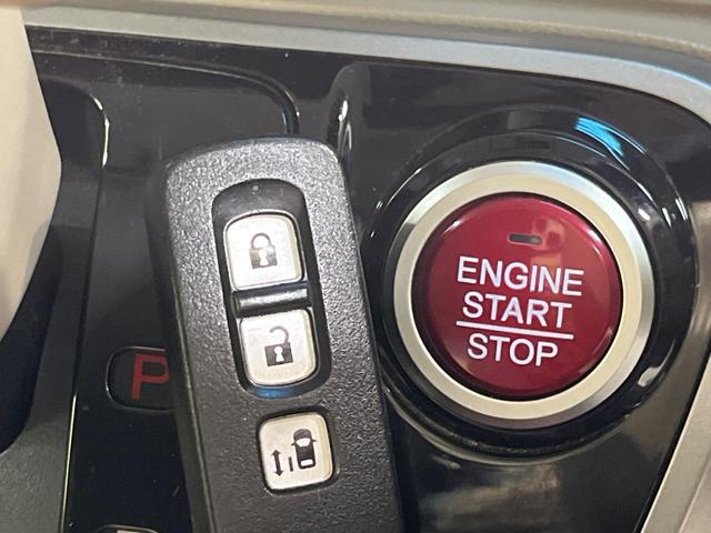 Ｎ－ＢＯＸ Ｇ・Ｌパッケージ　純正ＳＤナビ　電動スライドドア　禁煙車　スマートキー　ＥＴＣ　純正１４インチアルミ　オートエアコン　ＣＤ／ＤＶＤ再生　地デジ　後席中央アームレスト（4枚目）