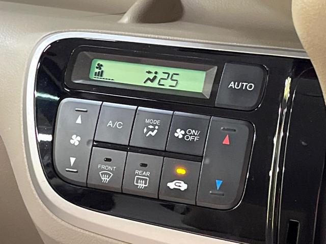 Ｎ－ＢＯＸ Ｇ・Ｌパッケージ　純正ＳＤナビ　電動スライドドア　禁煙車　スマートキー　ＥＴＣ　純正１４インチアルミ　オートエアコン　ＣＤ／ＤＶＤ再生　地デジ　後席中央アームレスト（7枚目）